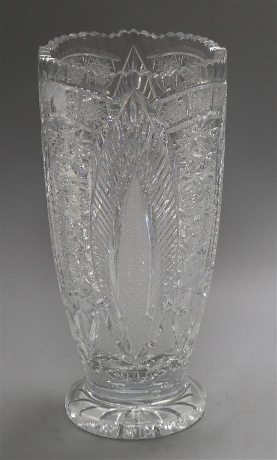A cut glass tall flower vase with stiff leaf design height 35.5cm